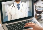 Immagine di PC portatile che comunica con un Medico